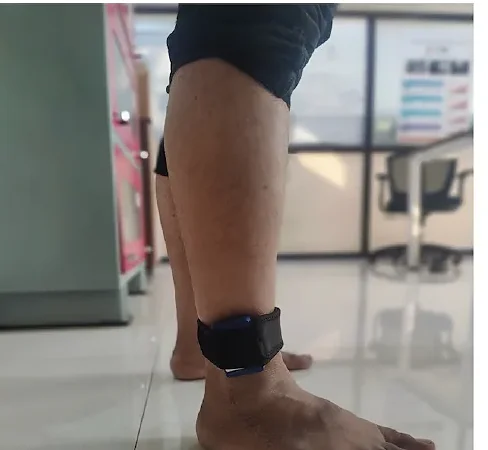 The FoGO Health ankle module worn on a participant's ankle during testing